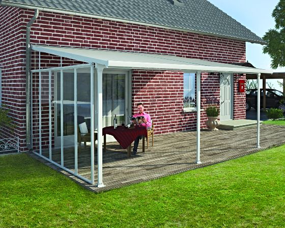 The Palram 13' Feria Sidewall Kit beautifully assembled on this Patio Cover designed to perfectly integrate with your home design and outdoor environment.